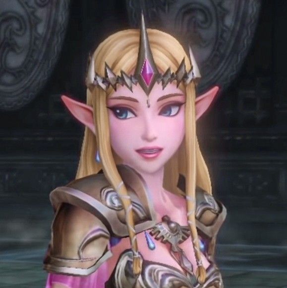 a woman with blonde hair and blue eyes is dressed up as elf princess zelda