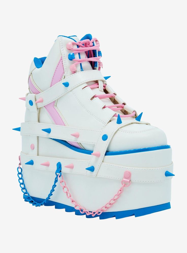 These platform sneakers are perfect for baddies who like to feel cute! They feature strappy buckles and pastel blue and pink spike detailing throughout. Plus  chain accents on the platforms.Listed in women's sizes.Heel: 4" Platform: 3''Polyurethane upper; EVA soleImported Luxury Purple Skate Shoes For Streetwear, Platform Shoes Japanese, Platform Shoes For Kid, Power Csm Shoes, Fabric Platform Shoes, Kawaii Shoes Sneakers High Tops, Customized Platform Shoes, Pastel Chunky Shoes, Sailor Mercury Shoes