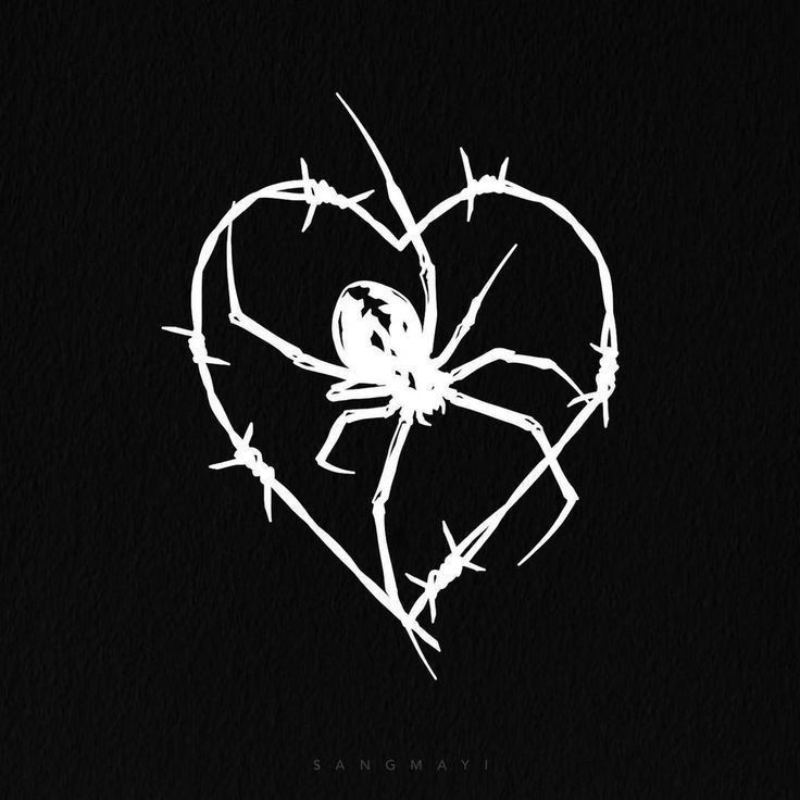 a heart with barbed wire in the shape of a spider on it's back