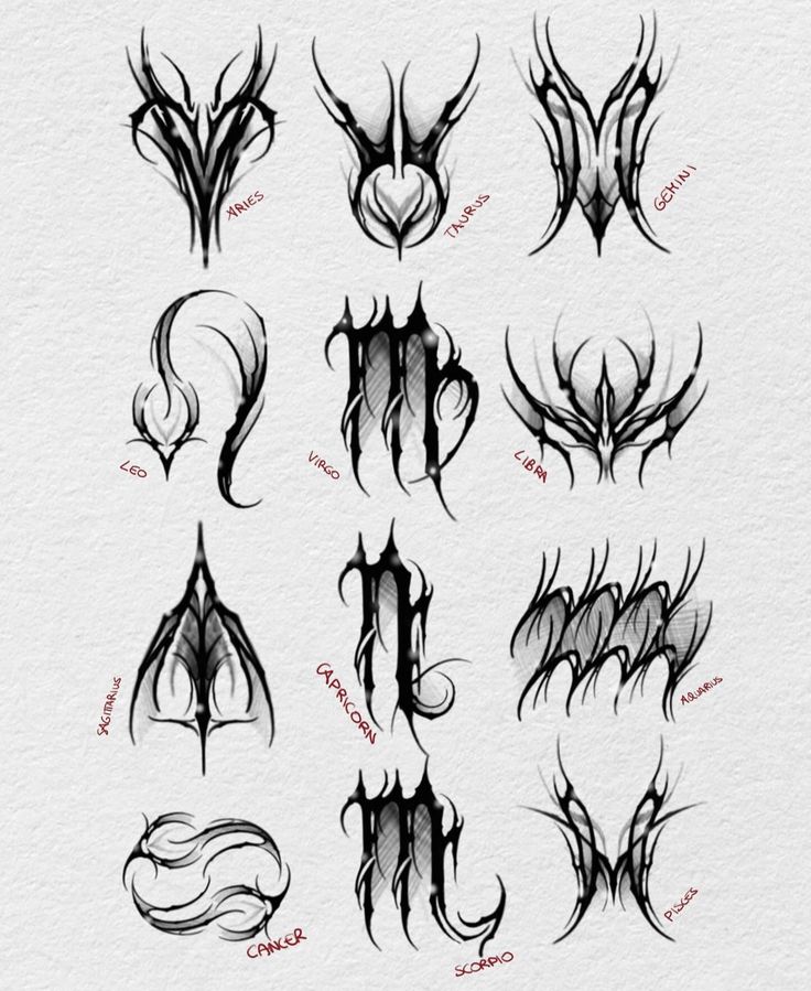 some type of tattoo designs on paper