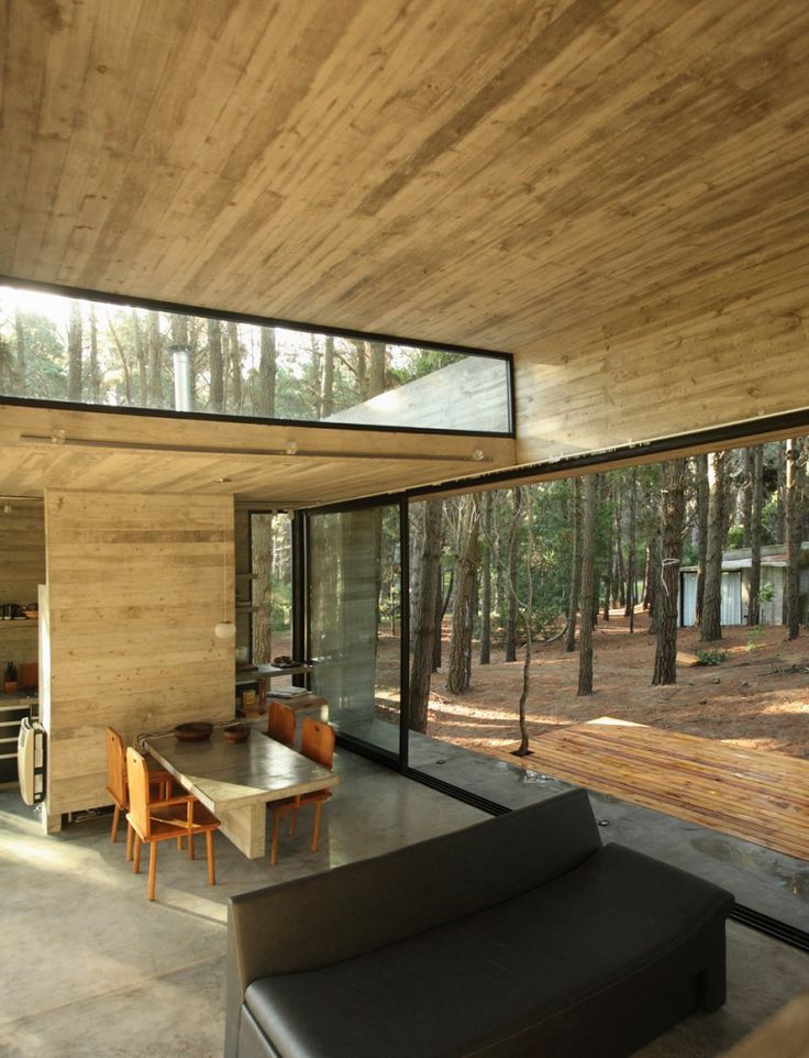 an instagram photo of the inside of a house with wooden walls and flooring