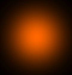 an orange light is shining in the dark