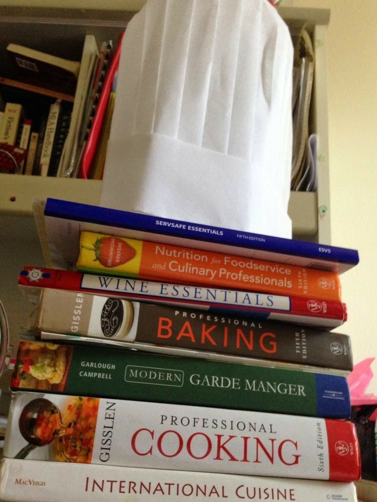 a stack of cookbooks stacked on top of each other