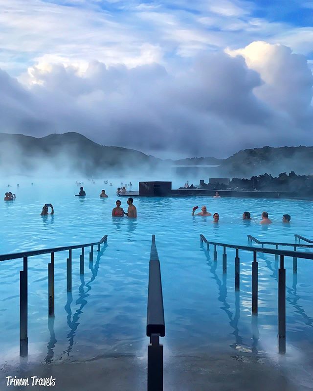 many people are swimming in the blue lagoon