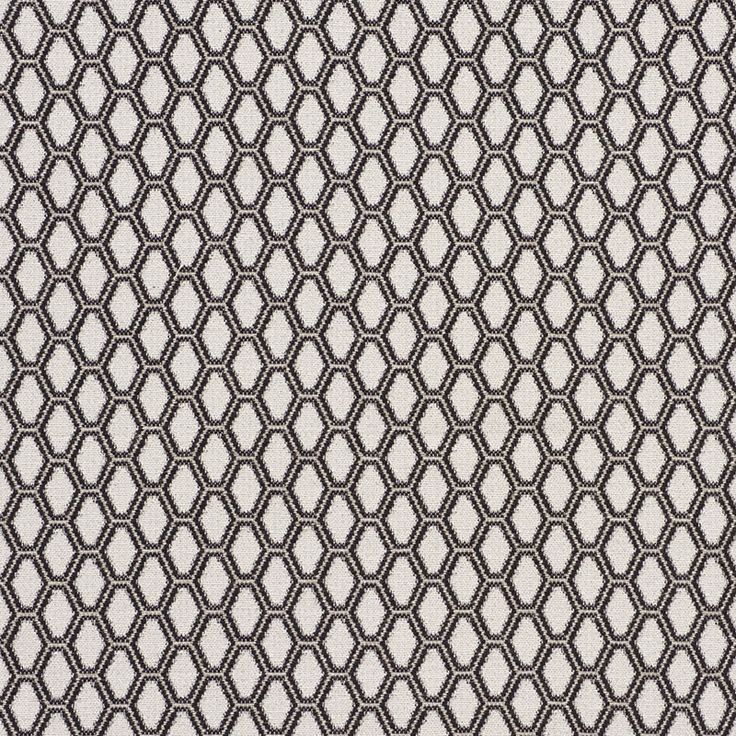 a black and white geometric pattern on fabric