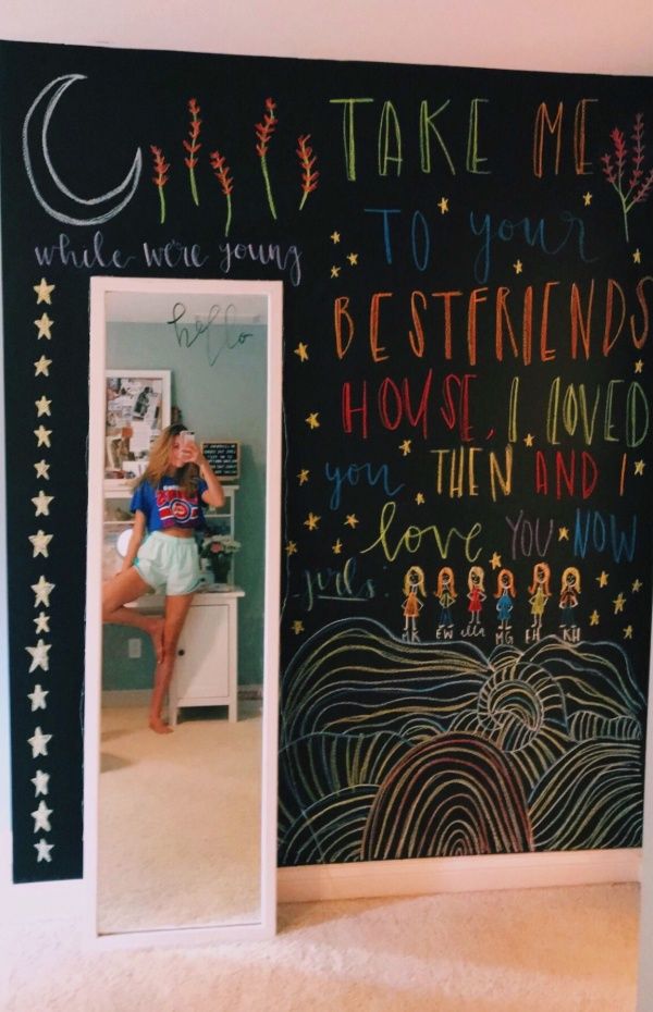 a chalkboard wall with writing on it and a mirror in front of it that says, take me to your best friends house