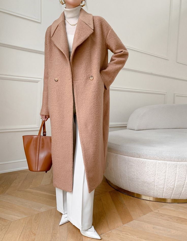 "Casual design style , long, oversized double- side handmade wool coat with viscose lining, The only coat you'll need come fall and winter, wool coat features a boxy silhouette, oversized lapels, and roomy sleeves. Crafted from 30% wool, it's designed to keep you warm and comfortable through colder seasons. Very suitable for your daily wear, party, travel, work, school, indoors and outdoor walks, spending time with family, shopping, etc. It is very comfortable and beautiful to wear The coat has Oversized Long Wool Coat For Work, Oversized Long Outerwear For Work, Oversized Long Wool Coat Single Breasted, Beige Oversized Wool Coat With Lapel Collar, Oversized Long Sleeve Wool Coat For Office, Oversized Beige Wool Coat For Workwear, Oversized Long Wool Coat For Office, Oversized Long Wool Coat, Tan Wool Coat