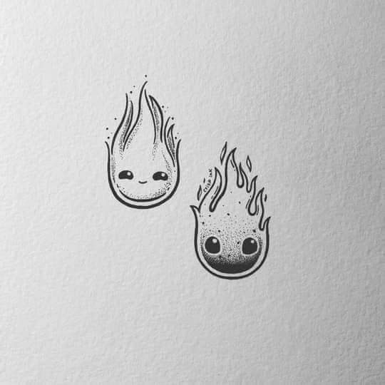 two black and white drawings of flames with faces on them, one is drawn in ink