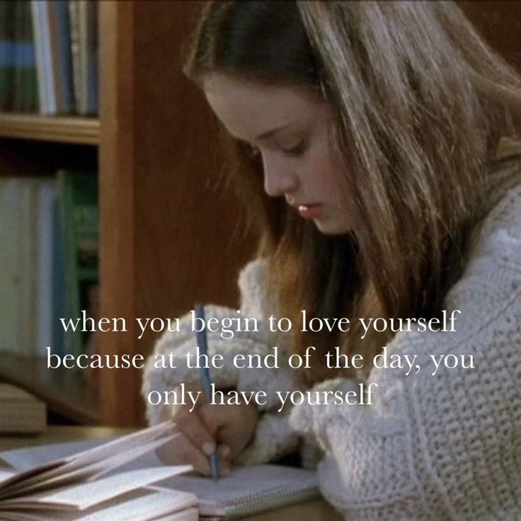 a girl is writing in her notebook with the quote when you begin to love yourself, because at the end of the day, you only have yourself