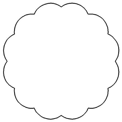 a blank paper circle cut out to be used as a flower ornament for crafting