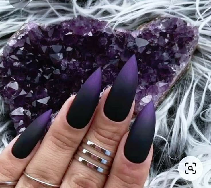 Stilleto Ombre Acrylic Nails, Black And Purple Ombré Nails, Black To Purple Ombre Nails, Purple Stilleto Nails Designs, Purple Black Ombre Nails, Edgy Stiletto Nails, Goth Nails Stiletto, Black And Purple Ombre Nails, Matte Black Halloween Nails