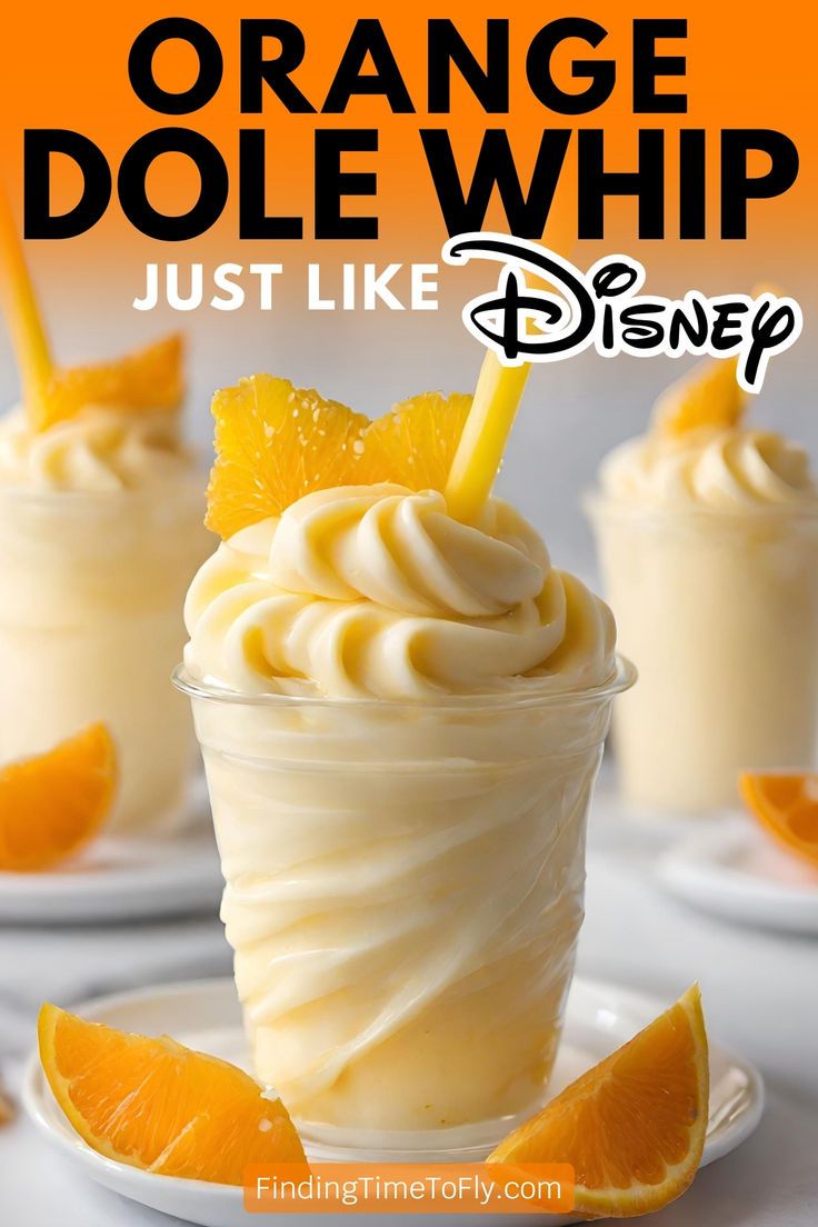 orange dole whip in a glass with an orange slice on top and the words, just like disney