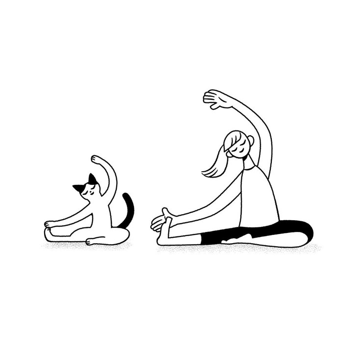 a person sitting on the ground with a cat in front of them and one hand reaching out