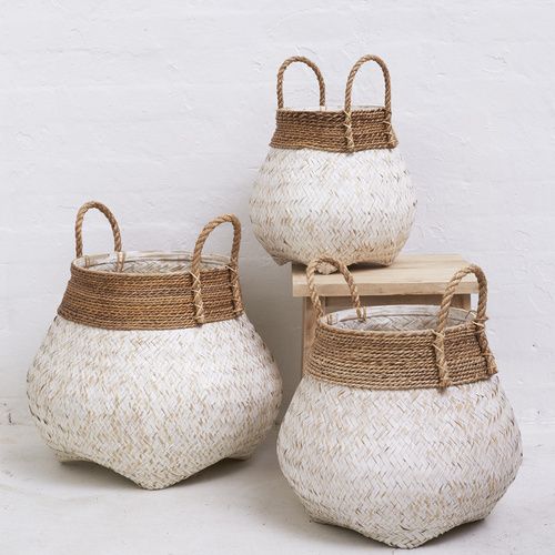 three woven baskets sitting on top of each other