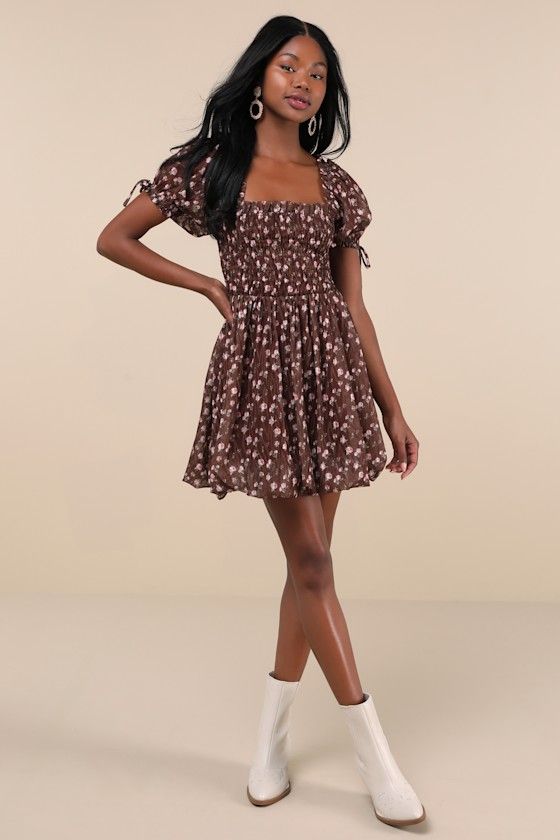 You'll be the first thing on your sweetie's mind in the Lulus Delightful Crush Brown Floral Smocked Puff Sleeve Mini Dress! Lightweight woven fabric, with a burnout design and ditsy floral print throughout, shapes short puff sleeves with elastic cuffs and bow details. Ruffle-trimmed square neckline tops a smocked bodice with a fitted waist. Flaring skirt finishes at a bubble-style mini hem. Fit: This garment fits true to size. Length: Mid-thigh. Size medium measures 26.5" from shoulder to hem. B Fall Short Dresses Outfit, Fitted Cotton Smocked Dress With Ditsy Floral Print, Cute Fitted Smocked Mini Dress, Brown Puff Sleeve Dress With Smocked Bodice, Cute Smocked Puff Sleeve Dress, Cute Mini Smocked Dress With Smocked Bodice, Spring Fitted Brown Smocked Dress, Brown Fitted Smocked Dress With Smocked Back, Fitted Brown Smocked Dress For Spring