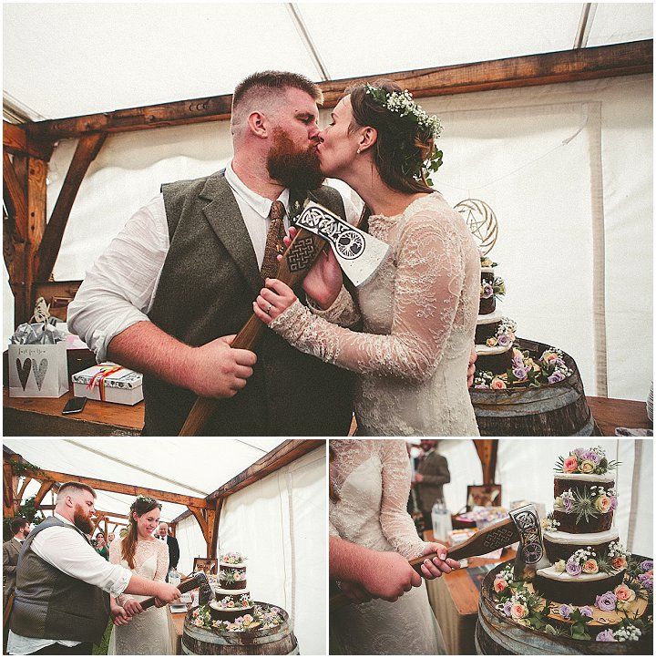 the bride and groom are kissing in front of their wedding cake at this outdoor reception