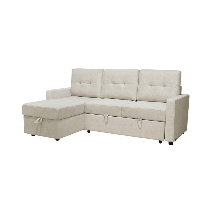 a white sectional couch with storage underneath it