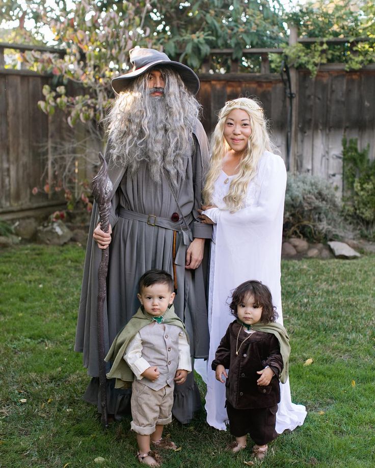 an adult and two children are dressed up as gandala and the hobbo