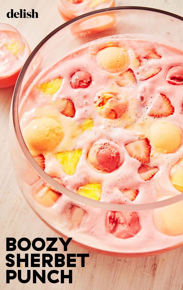 a bowl filled with ice cream and fruit