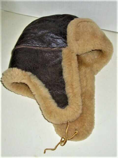 Vintage 2 -3 plus Year old Sheep Skin Hunters Earflap Hat in very nice used condition. Size SMALL Womens sz. Hard to measure accurately. Item has normal age and use wear. Hardly worn Please look at pictures and ask any questions. Item sold as used and as-is. Please view our other items. Sheepskin Hat, Classic Brown Hat For Cold Weather, Brown Winter Hats, Earflap Hat, Ushanka Hat Aesthetic Men, Brown Hat With Faux Fur Lining For Outdoor, Adjustable Brown Hat With Fleece Lining, Brown Hats With Ear Flaps For Cold Weather, Ushanka Hat Aesthetic