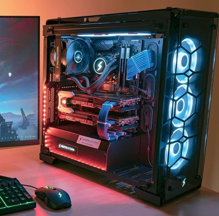 a desktop computer sitting on top of a desk next to a keyboard and monitor screen