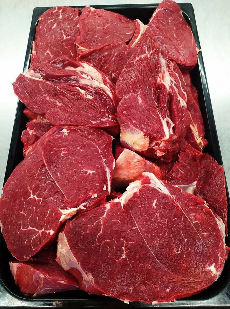 raw meat sitting in a tray ready to be cooked