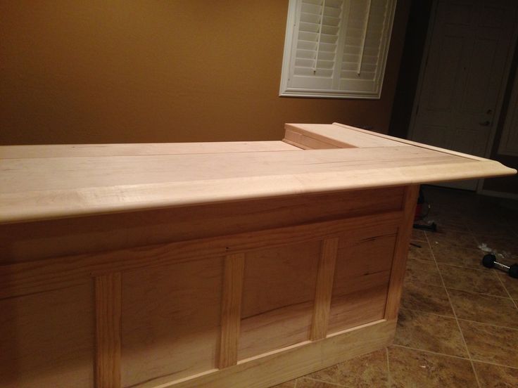 an unfinished kitchen counter in the process of being built