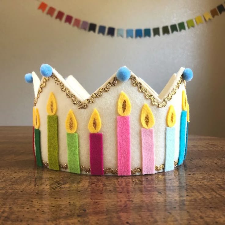 a crown made out of felt sitting on top of a table