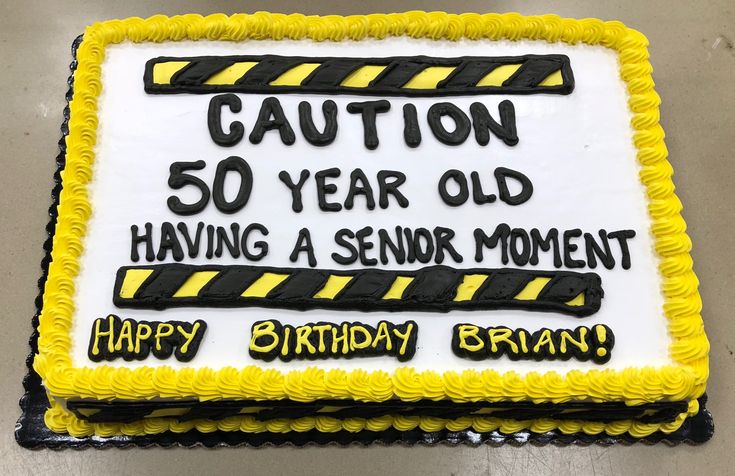 a birthday cake with the words caution 50 year old having a senior moment