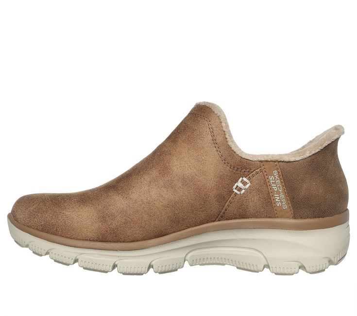 Get into the season with effortless cozy comfort wearing Skechers Hands Free Slip-ins Relaxed Fit Easy Going - Modern Hour. Designed with our exclusive Heel Pillow , this fashion bootie features a 3M Scotchgard treated vegan leather upper with faux fur lining and a cushioned Skechers Air-Cooled Memory Foam insole. | Skechers Women's Slip-ins RF: Easy Going - Modern Hour Boots | Medium Width | Skechers Hands Free Slip-ins for an easy fit | Exclusive Heel Pillow holds your foot securely in place | Skechers Boots, Leather Slip On Shoes, Wide Shoes, Kinds Of Shoes, Horse Stuff, Skechers Women, Comfort Wear, Easy Going, Winter Shoes