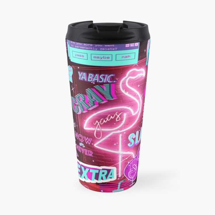 a pink flamingo travel mug sitting on top of a table