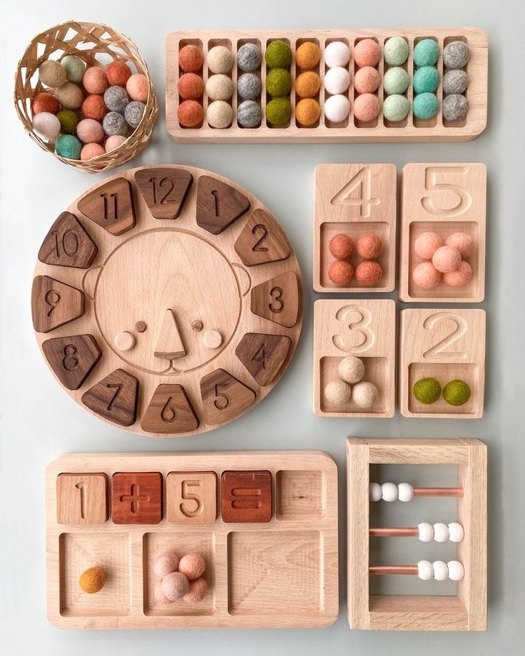 an assortment of wooden toys with numbers and beads