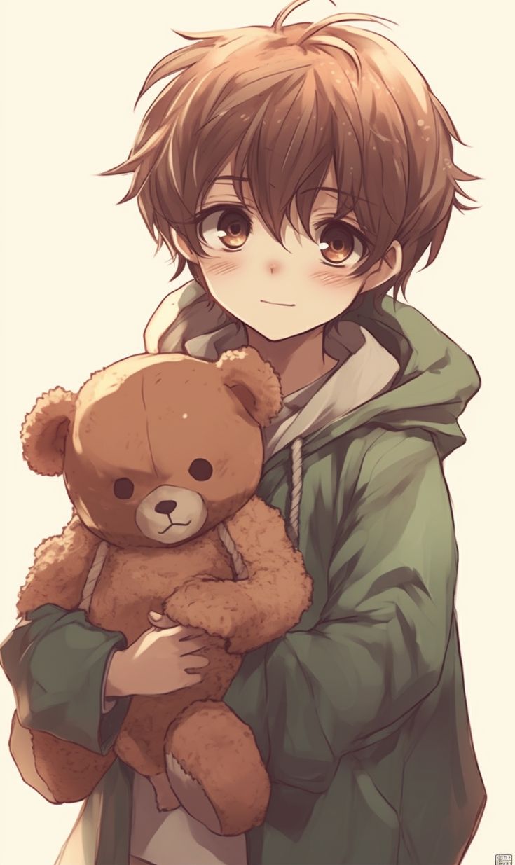 a boy holding a teddy bear in his arms