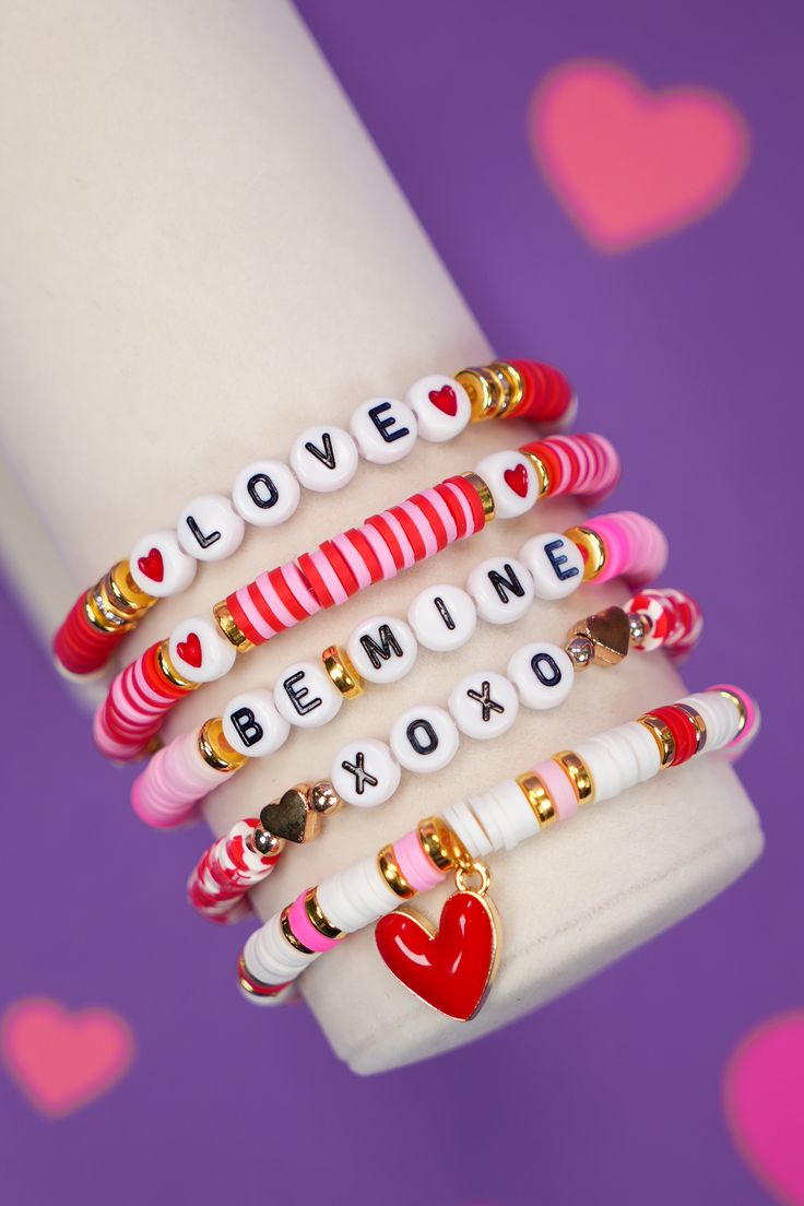 the bracelets are stacked on top of each other