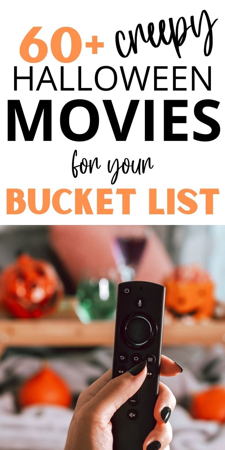 a person holding a remote control in their hand with text overlay that reads, 60 + energy halloween movies for your bucket list