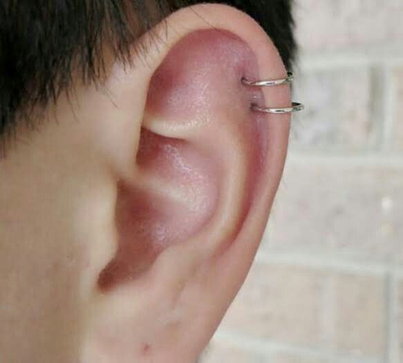 a person with a piercing in their ear