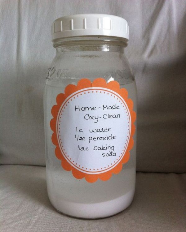 a glass jar with a label that says home made soy clean