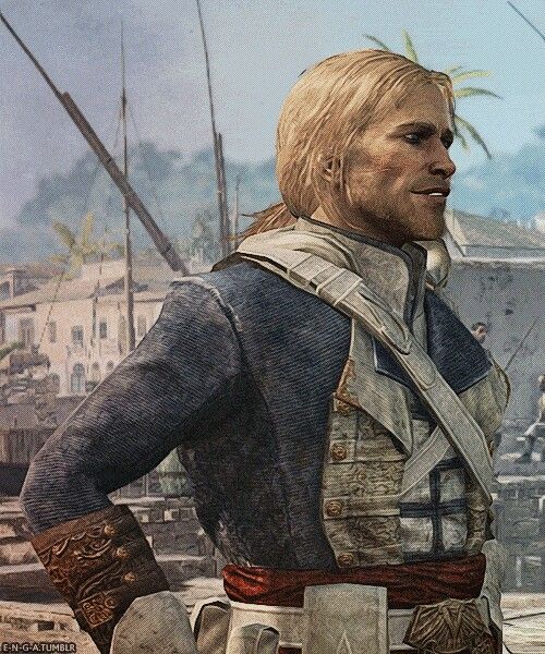 an image of a man with blonde hair standing in the middle of a town and looking off into the distance