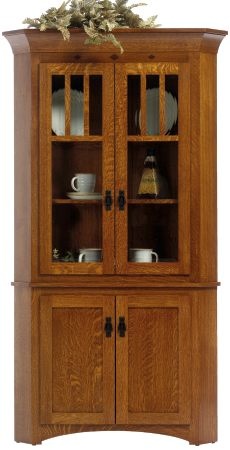 a wooden china cabinet with glass doors