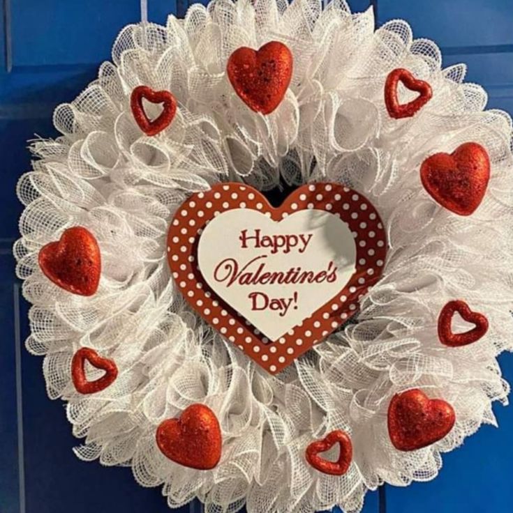 a valentine's day wreath with hearts on it