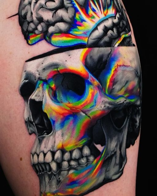 a colorful skull with a brain on it's side and another in the background