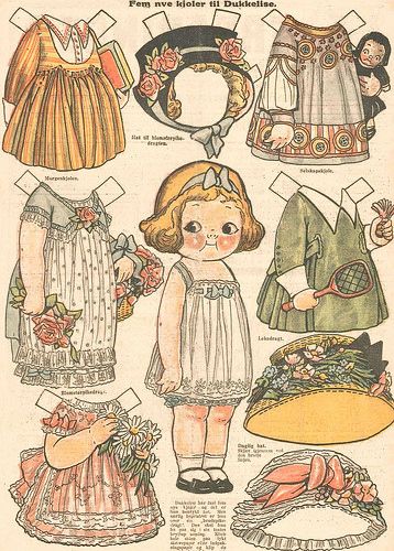 an old fashioned paper doll with many different outfits