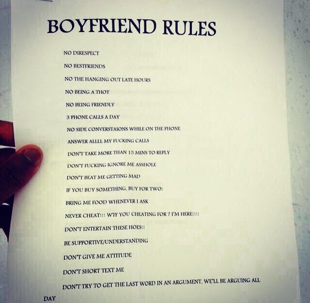 a person holding up a paper with the words boyfriend rules written on it in front of them