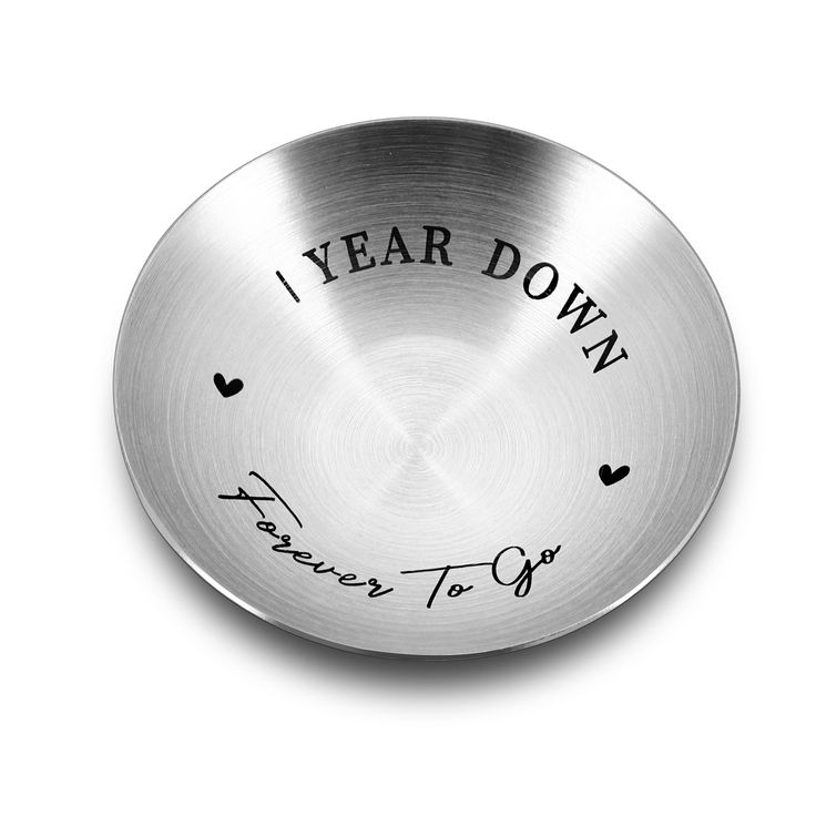 a metal bowl with the words i year down written on it