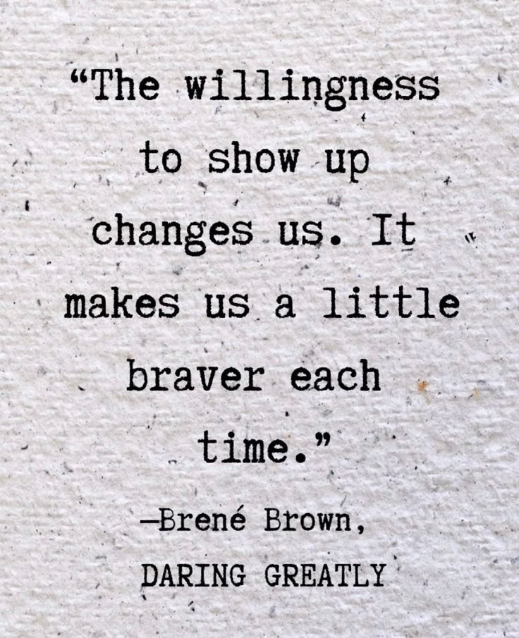 an old quote on paper that says, the willingness to show up changes us it makes us a little braver each time