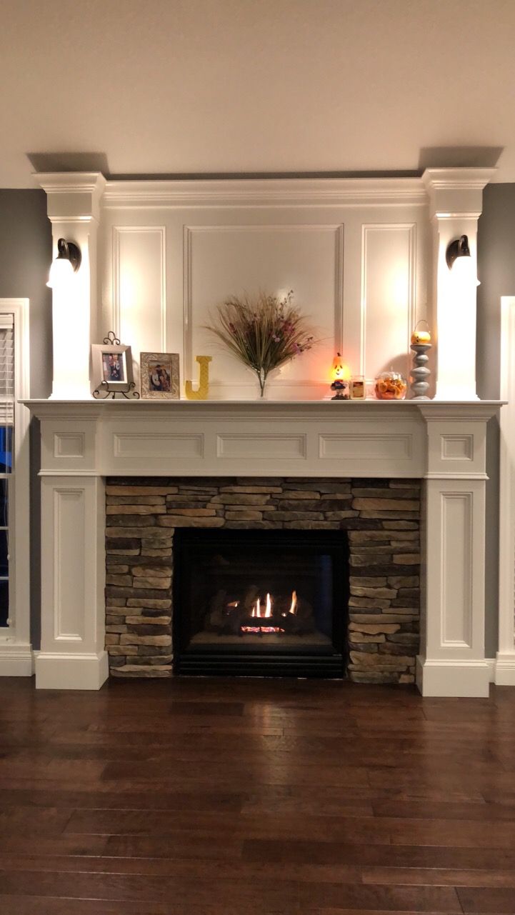 an image of a fireplace in the middle of a room