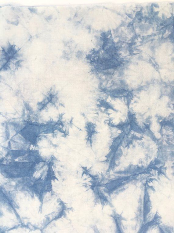 a blue and white tie dyed background