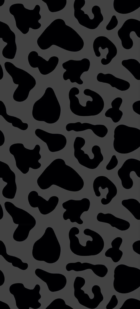 an animal print pattern with black and grey colors on the bottom half of the image