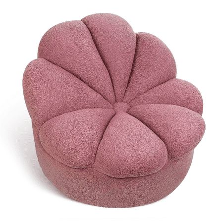 a pink flower shaped ottoman sitting on top of a white floor