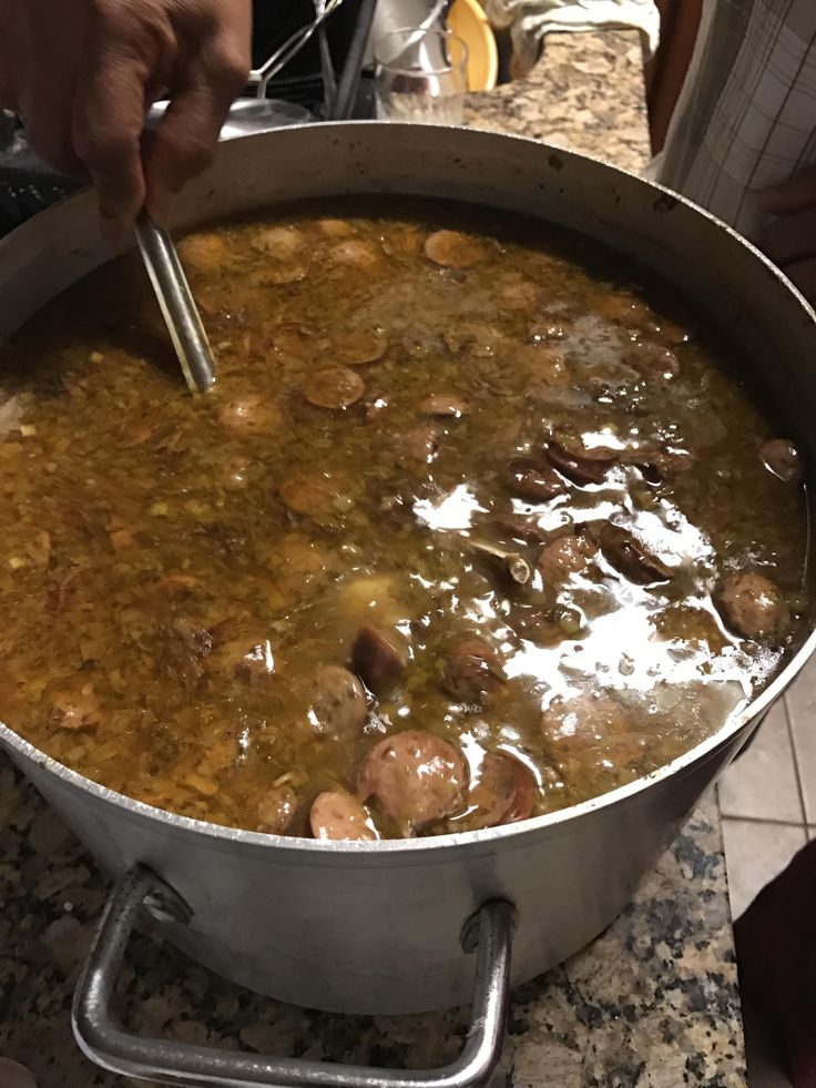 a large pot filled with food on top of a counter